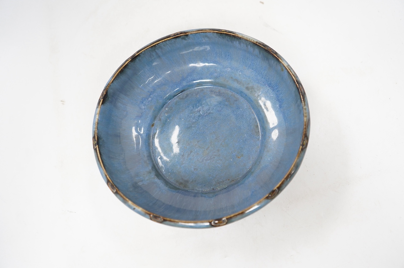 A Royal Doulton blue bowl, designed by Ethel Beard and monogrammed to the base, 25cm diameter. Condition - good